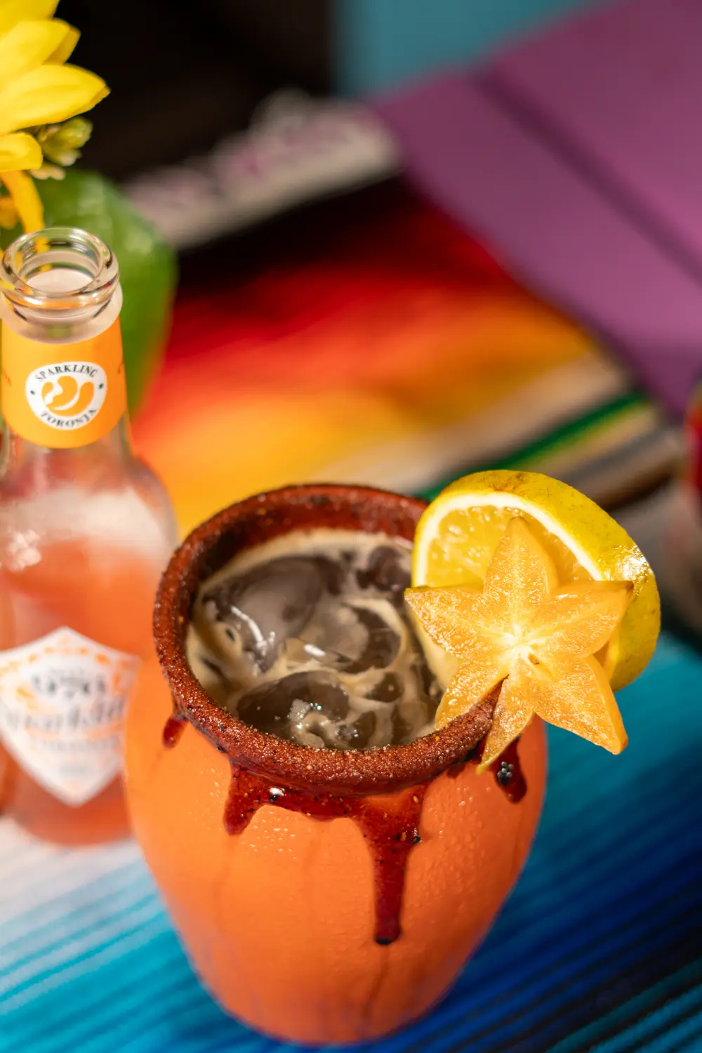 Cóctel de la casa con naranja
